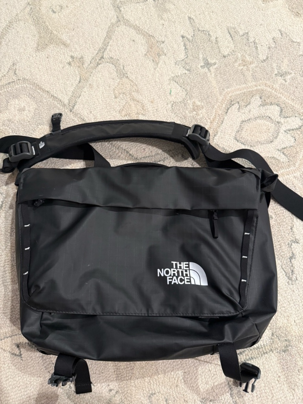 The North Face Black Messenger Bag with Front Zip Pocket